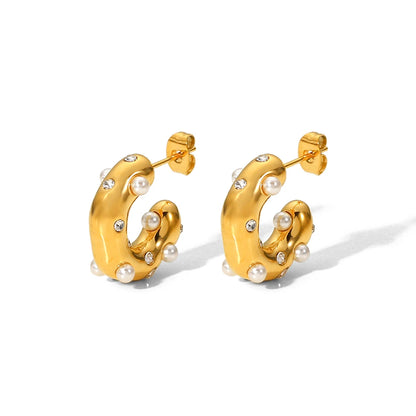 Brincos CIDEIVAN em aço inoxidável dourado com pedras de zircônia e pérolas, design moderno e sofisticado.