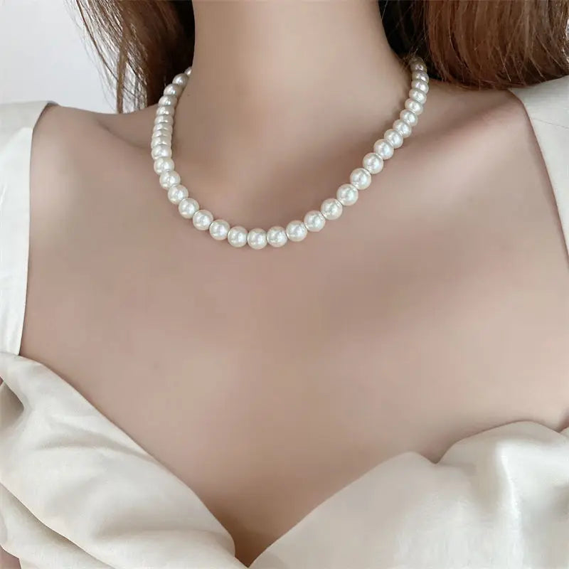 colar de perola e aço inox feminino, sofisticado e elegante.